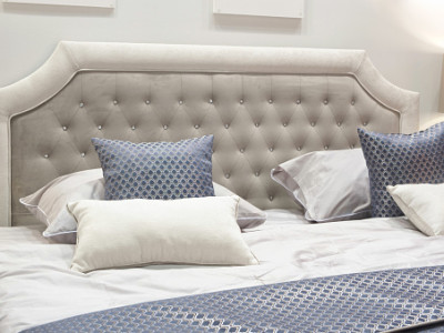classic interior design bedroom gray and blue, Interior of a bedroom with cushions